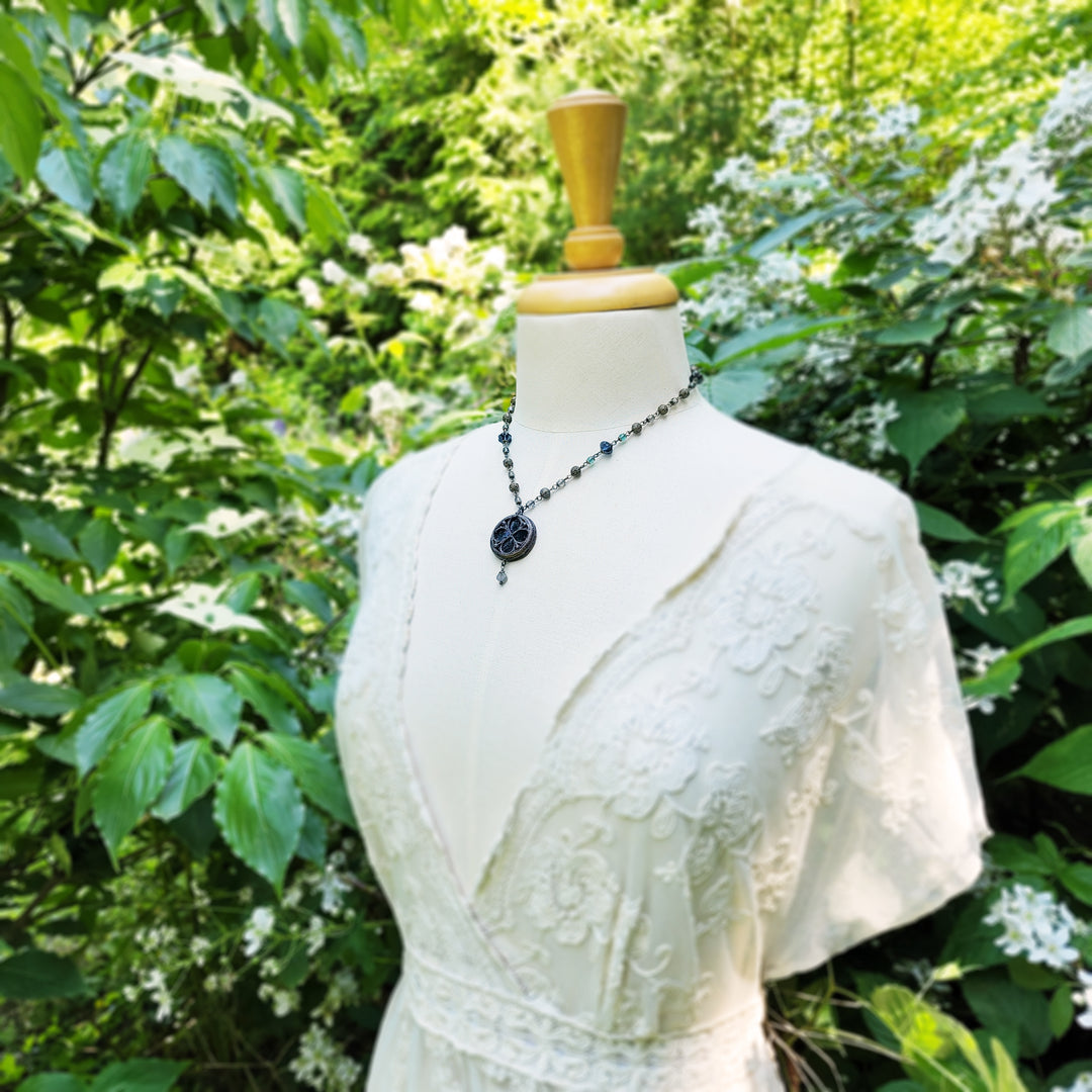 depths of the sea - floriated clover miracle window amulet