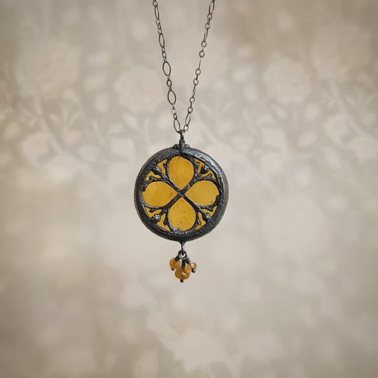 the infinity of the hive - floriated clover miracle window amulet