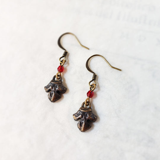 fleur earrings : ruby glass & antiqued bronze