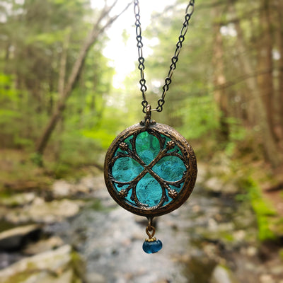 halcyon - floriated clover miracle window amulet