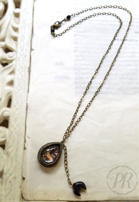Rabbit Tapestry & Crescent Amulet