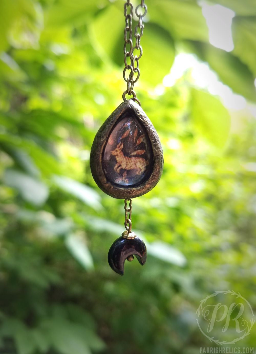 Rabbit Tapestry & Crescent Amulet