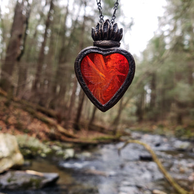 peace arrives as a hummingbird - a sacred heart amulet