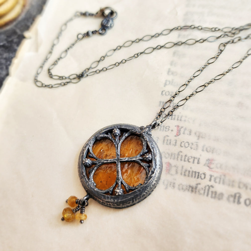 the infinity of the hive - floriated clover miracle window amulet