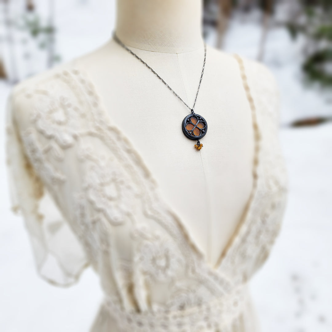 the infinity of the hive - floriated clover miracle window amulet